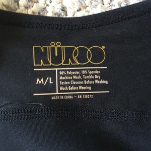 NUROO baby wearing shirt